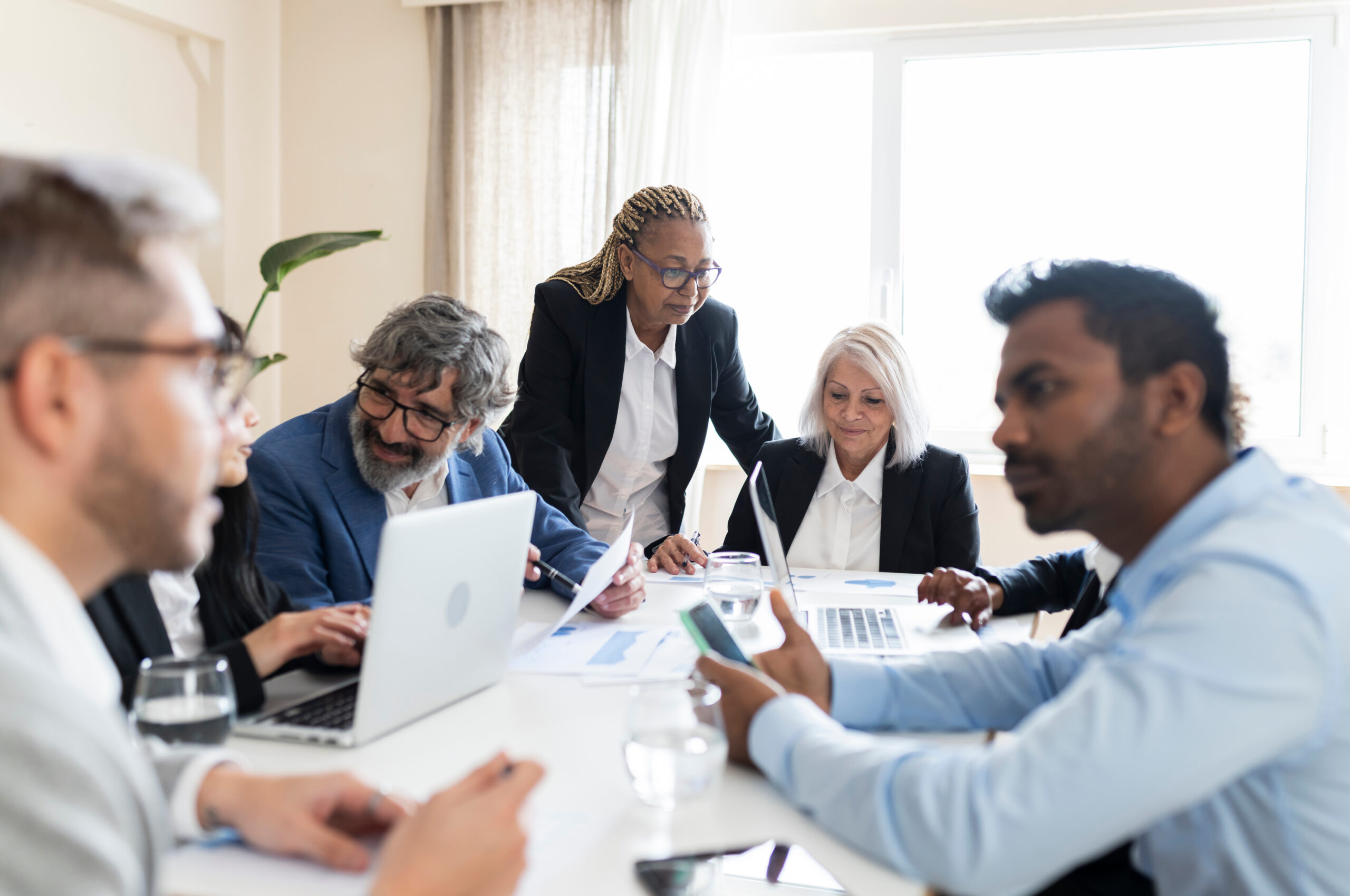 Multiracial work group, people of different ages working together